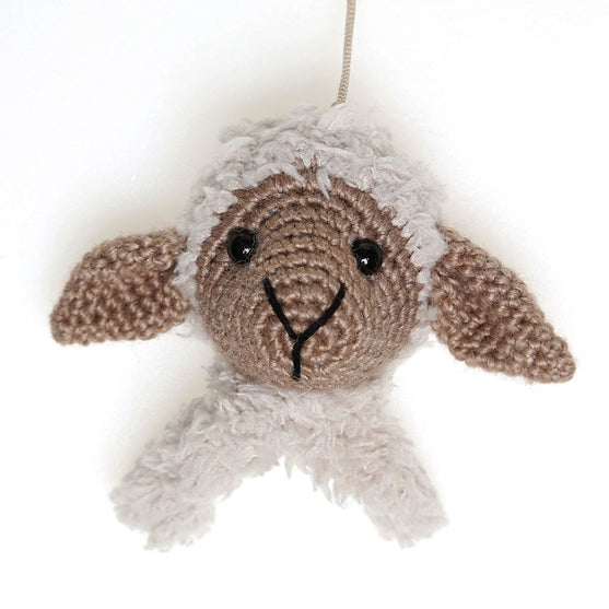 Chanel sur doudou et rond en bois
4