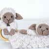 Chanel on cosy blanket and wooden ring
6