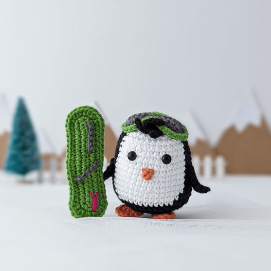 Brady - Le pingouin snowboarder
6
