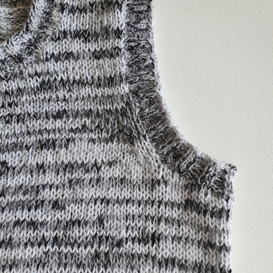 

Jane - Pull sans manches
5