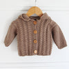 

Gilet à torsades avec capuche - Baby
3