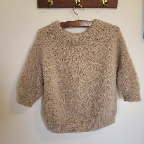 

Suri – Sweater
10