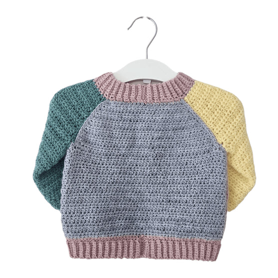 

Candy - Children’s Sweater
3