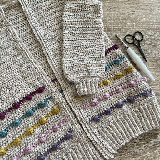 

Bubblegum - Children’s cardigan
4